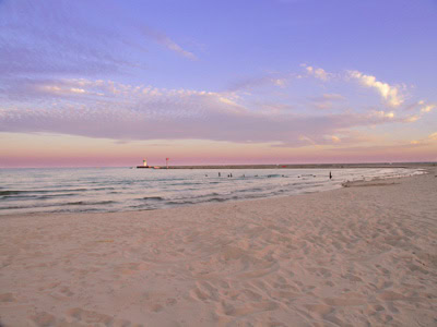 Scenic view of Waukegan Beach at sunset with Lake Michigan and sky.