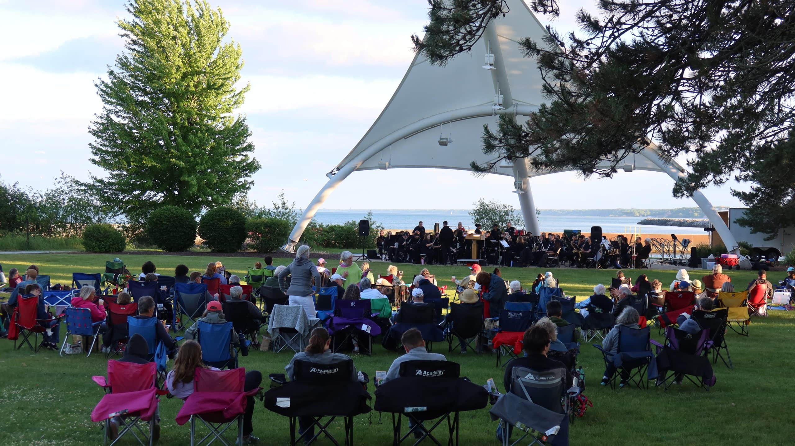 Audience enjoying outdoor concert near Lake Michigan in Waukegan, IL.